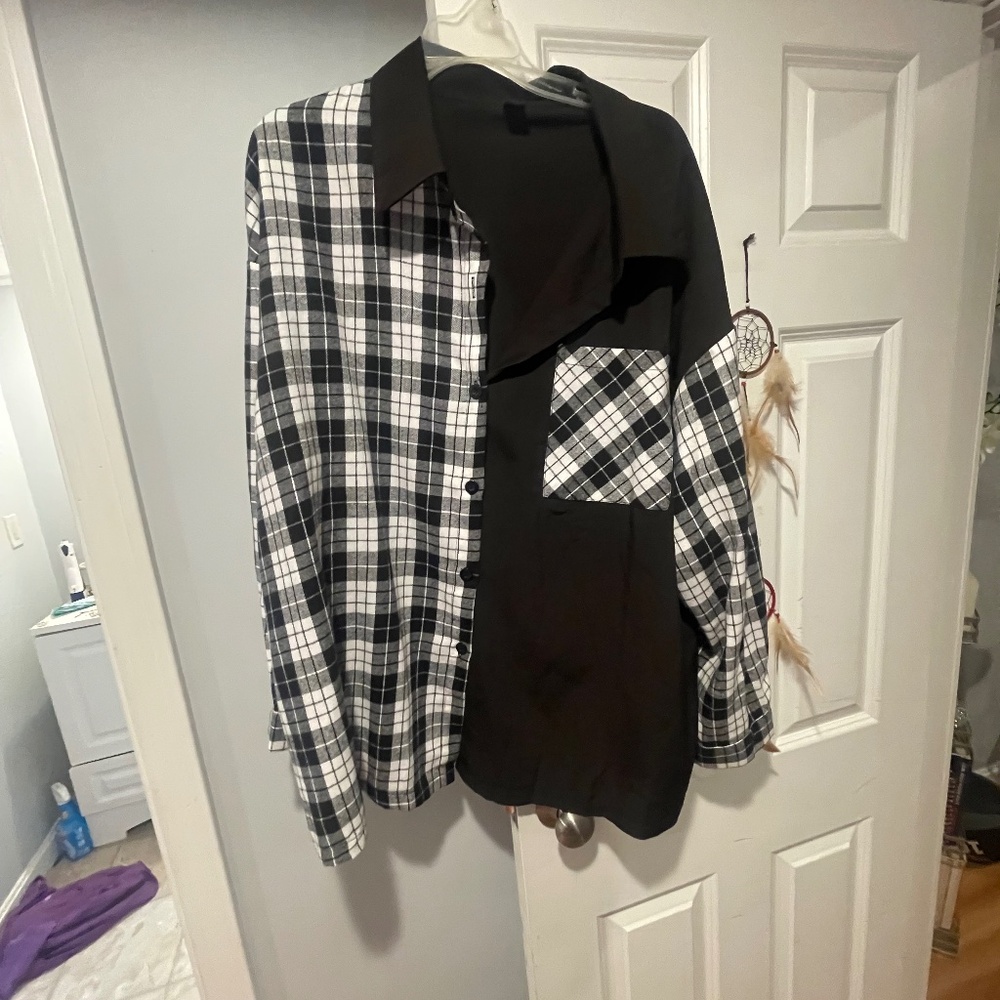 Black and white checkered blouse. Never worn.